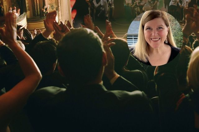 A cheering crowd and image of Victoria Cairl