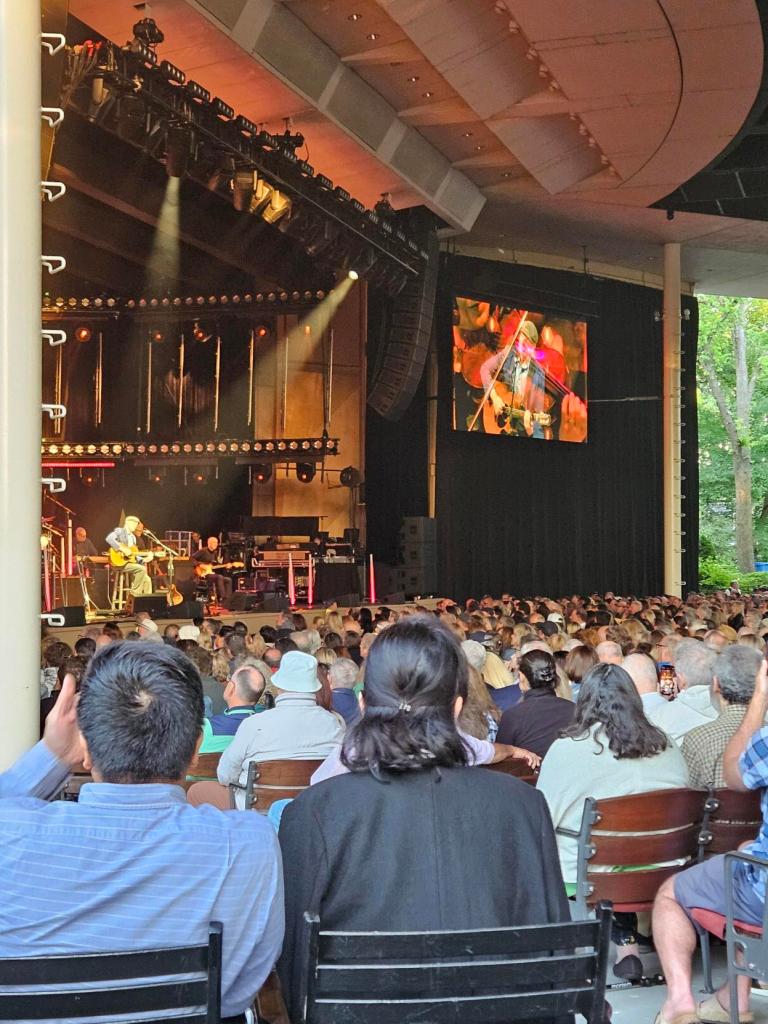 A sold out crowd enjoys the music of James Taylor