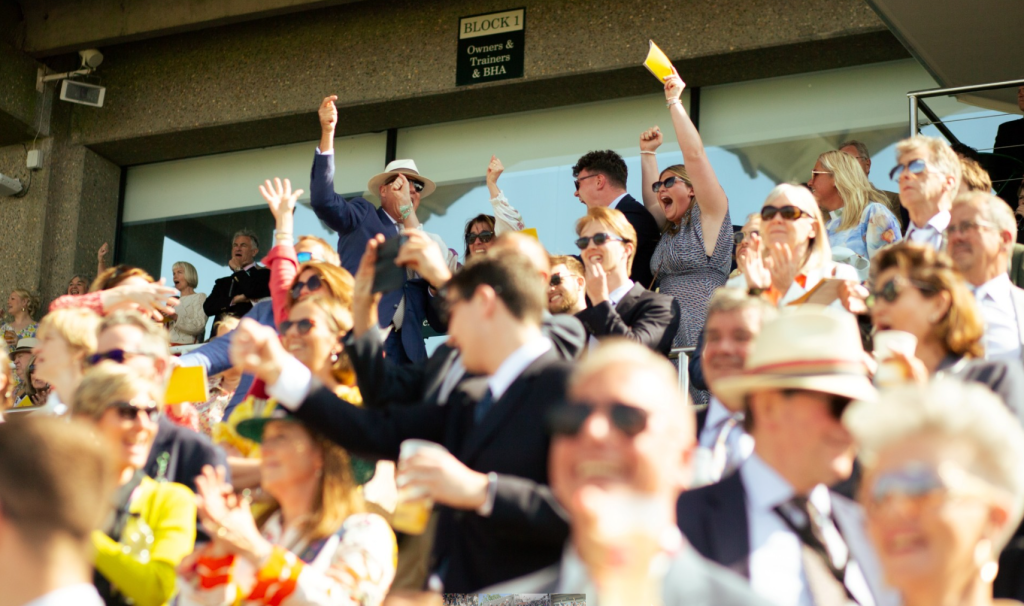 Fans enjoying a race result at Goodwood